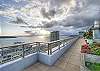 Roof top deck featuring incredible views of the city and the Puget Sound plus outdoor heating, gas grills and seating areas!