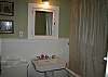 Features a clawfoot tub.
