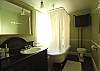 Features Deep Clawfoot Soaking Tub.