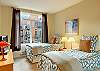 Features a flat panel 26" TV. Twins can also be set up as a King bed. All bedrooms feature lined drapes.