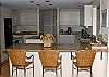 Kitchen features granite counters and a center island