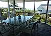 This is the screened porch area with amazing ocean views.