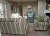 Another view of formal living area.  Oceanfront decks to the right.