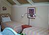 The loft bedroom is adorable with two twin beds, TV with DVD and TV/VCR for movies