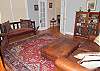 Formal living room furnished with antiques