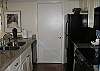 Renovated kitchen with granite tile counter tops