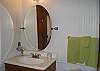 Bath 2 has cute beadboard and tub/shower.
