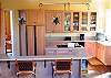 Looking at the kitchen from the living area