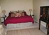 Master bedroom features a king bed and private bath