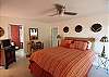 Downstairs queen bedroom with full bath and deck access