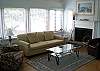 Well appointed living area with new hardwood flooring, enjoy great views of 11th green
