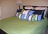 This bedroom has a queen bed and is located upstairs on the main level. It shares a bath with the trundle bedroom