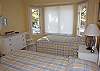 Bedroom 3 has two twin beds and a full bath