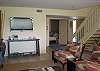 Another view of living room and large flat screen TV