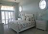 King bed, access to the upper deck and private bath