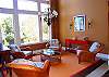 Off the entrance foyer, a relaxing sitting area