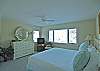 May be a second master suite with king bed, TV and full bath with tub/shower