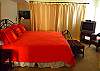 King bed, TV and full bath with tub/shower