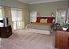 Master bedroom with king bed and private bath