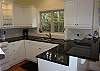 Beautiful granite counter tops throughout kitchen.