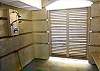 Large outdoor shower in fully enclosed area with seating