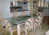 Dining table seats six. Pass thru to kitchen