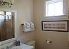 Full bath with custom tile shower