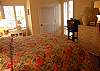 Bedroom features a king bed, TV and  private bath