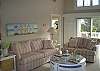 Spacious living area with deck access