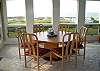 Kitchen table seats six.  Bar area seats two more