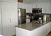 Newly renovated for 2009! Beautiful granite counters, hardwood flooring and stainless steel appliances