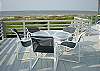 Relax and enjoy meals on the deck overlooking the ocean