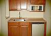 Microwave and small refrigerator, great for young people!