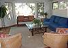 Enjoy quiet time and tranquil views from the sunroom