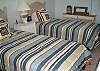 Two twin beds in the loft area