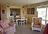 Looking toward the dining and kitchen area