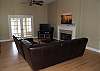 Hardwood flooring, gas fireplace and ceiling fan