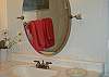 Master bath is nicely updated with beadboard walls and new vanity