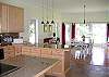 Kitchen opens to dining area