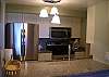 Beautifully updated kitchen with custom cabinets, granite counters and sensor lighting