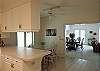 View across counter space toward eat in area