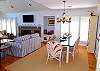 Dining area with table that seats 6, another table in the kitchen seats 4