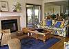 Spacious living area with access to deck and screened porch
