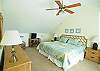 King bed, flat screen TV, private bath and loft sitting area with addition deck and ocean views