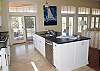 Kitchen opens to the living area so the cook and still be a part of the fun!