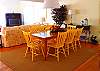 Maine Cottage furnishings add to the charm and appeal of this cute villa.  Dining table seats 8