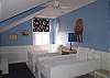 Twin beds, sitting area, desk and private bath