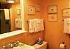 Hall bath with pedestal sink and shower