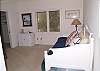 Trundle bed, walk in closet, TV shares bath with queen bedroom