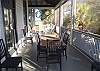 Additional table with seating for enclosed, outdoor dining